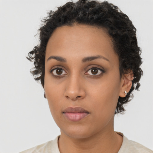 Neutral latino young-adult female with short  black hair and brown eyes
