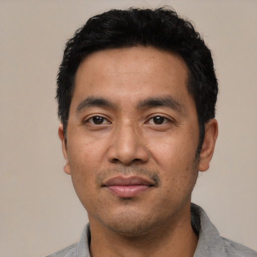 Neutral asian young-adult male with short  black hair and brown eyes