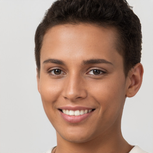 Joyful white young-adult female with short  brown hair and brown eyes