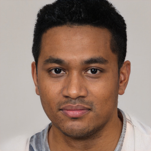 Neutral black young-adult male with short  black hair and brown eyes