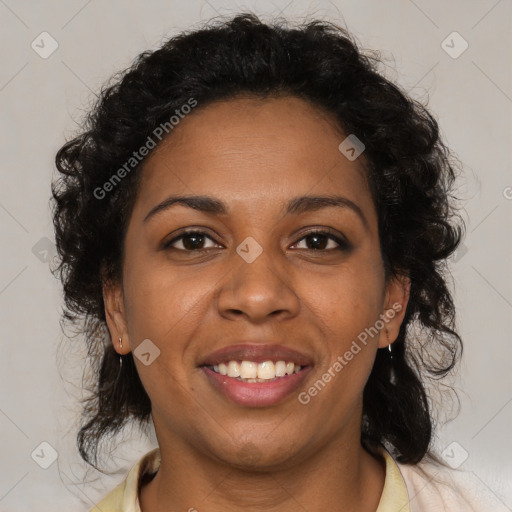 Joyful black young-adult female with medium  brown hair and brown eyes