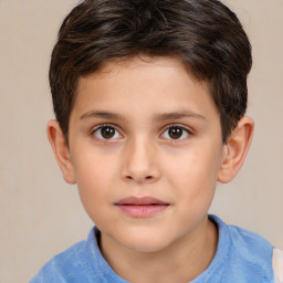 Joyful white child male with short  brown hair and brown eyes