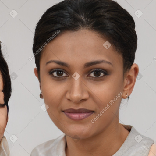 Joyful latino young-adult female with medium  brown hair and brown eyes