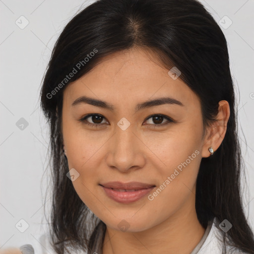 Joyful latino young-adult female with long  brown hair and brown eyes