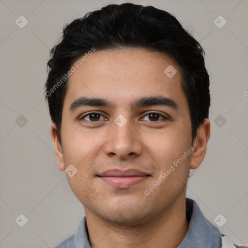 Joyful latino young-adult male with short  black hair and brown eyes