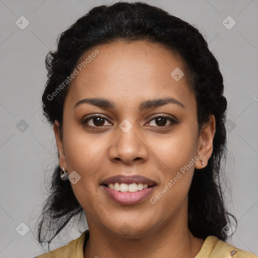 Joyful latino young-adult female with long  black hair and brown eyes