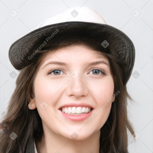 Joyful white young-adult female with long  brown hair and grey eyes