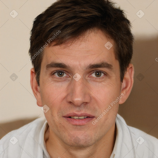 Joyful white adult male with short  brown hair and brown eyes