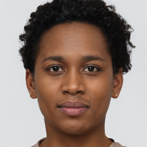 Neutral black young-adult female with short  brown hair and brown eyes