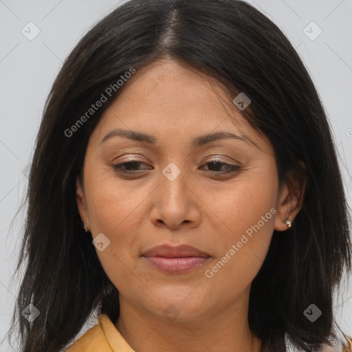 Joyful asian adult female with medium  brown hair and brown eyes