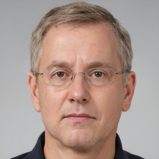 Neutral white middle-aged male with short  brown hair and grey eyes