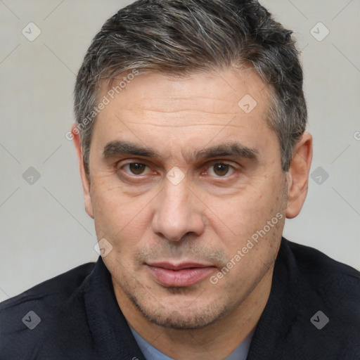 Neutral white adult male with short  brown hair and brown eyes