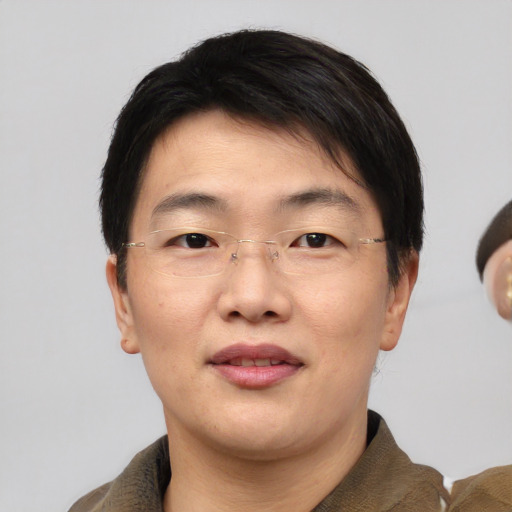 Neutral asian adult male with short  brown hair and brown eyes