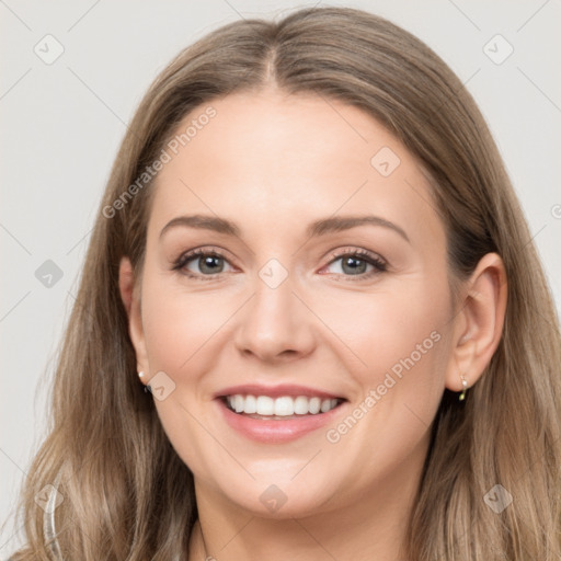 Joyful white young-adult female with long  brown hair and grey eyes