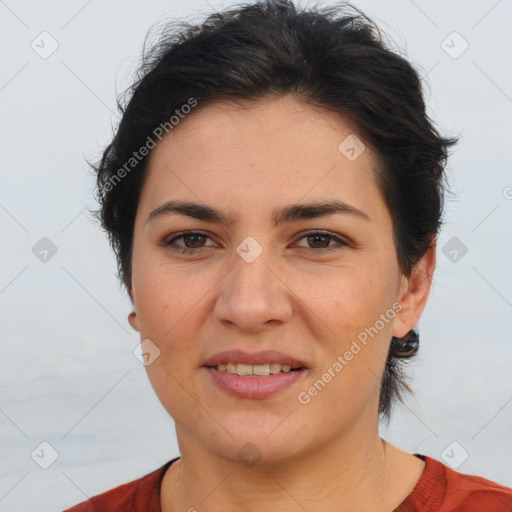 Joyful white young-adult female with short  brown hair and brown eyes