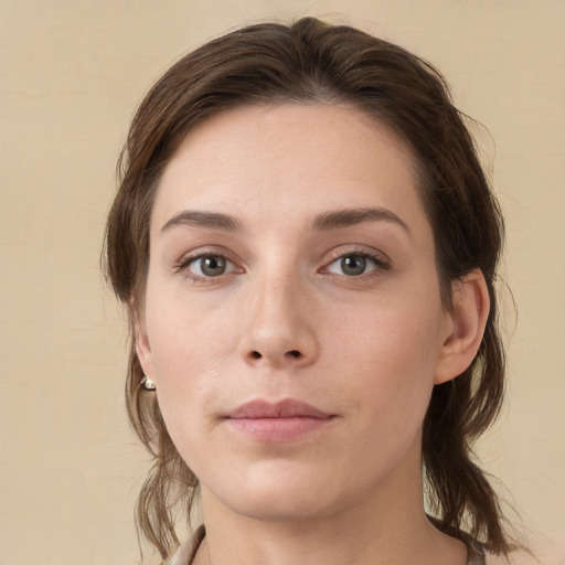 Neutral white young-adult female with medium  brown hair and grey eyes