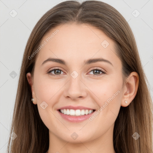 Joyful white young-adult female with long  brown hair and grey eyes