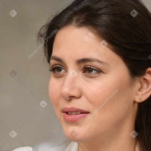 Joyful white young-adult female with medium  brown hair and brown eyes