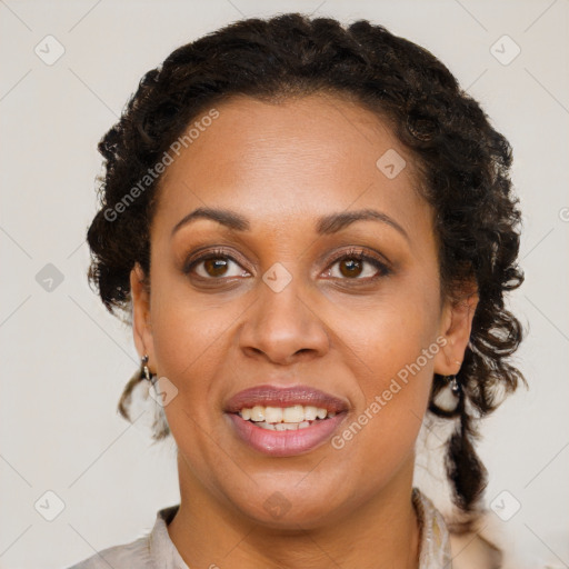 Joyful black young-adult female with medium  brown hair and brown eyes