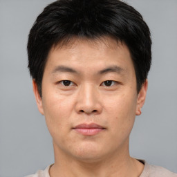 Neutral asian young-adult male with short  black hair and brown eyes