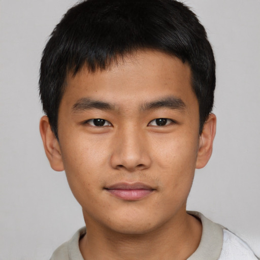 Neutral asian child male with short  brown hair and brown eyes