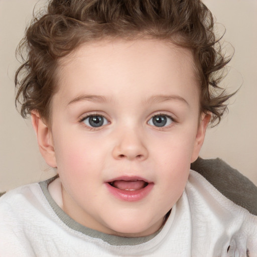 Joyful white child female with short  brown hair and blue eyes