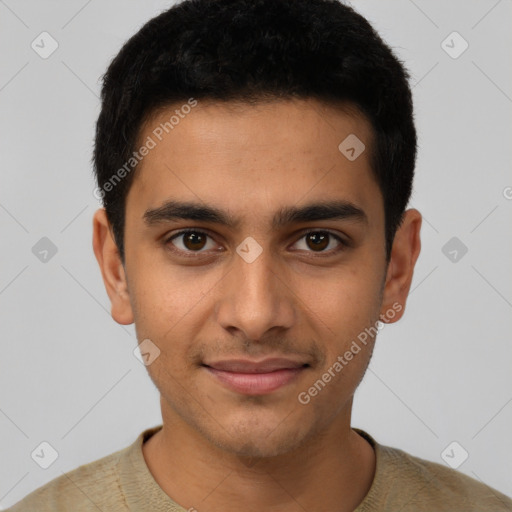 Joyful latino young-adult male with short  black hair and brown eyes