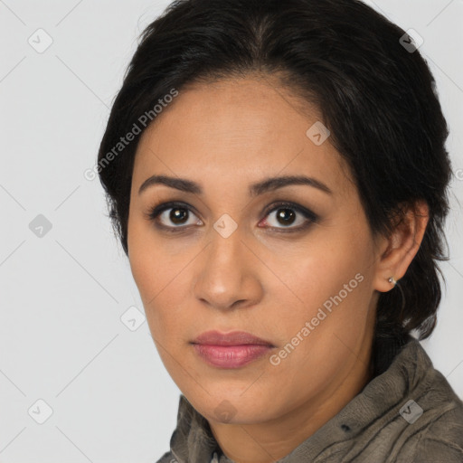 Joyful latino young-adult female with long  brown hair and brown eyes