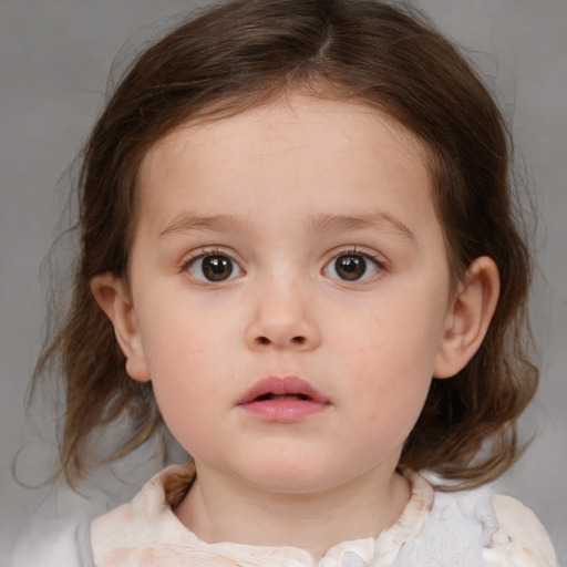 Neutral white child female with medium  brown hair and brown eyes