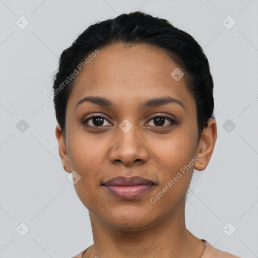 Joyful latino young-adult female with short  black hair and brown eyes