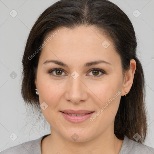 Joyful white young-adult female with medium  brown hair and brown eyes