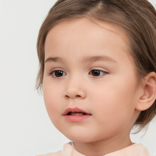 Neutral white child female with medium  brown hair and brown eyes