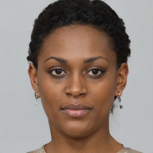 Neutral black young-adult female with short  black hair and brown eyes