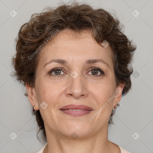 Joyful white adult female with short  brown hair and brown eyes