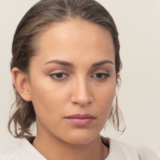 Neutral white young-adult female with medium  brown hair and brown eyes