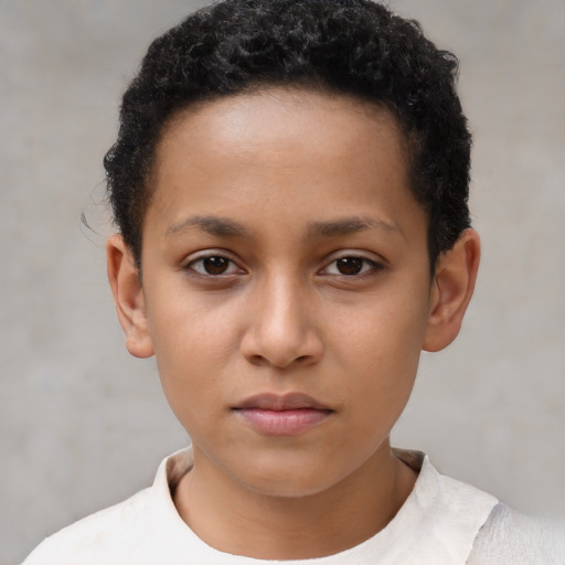 Neutral latino child female with short  brown hair and brown eyes
