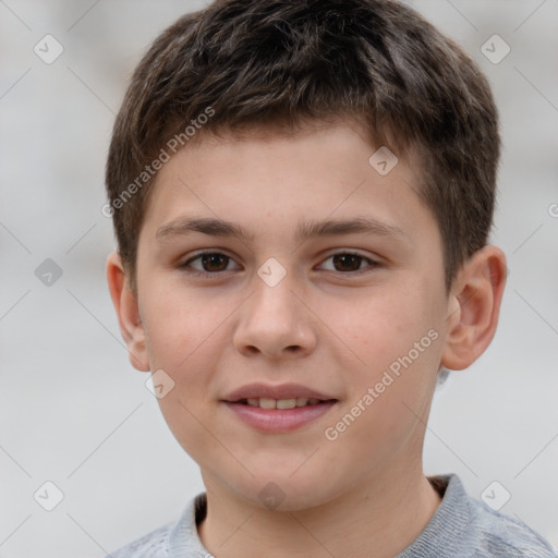 Joyful white child male with short  brown hair and brown eyes