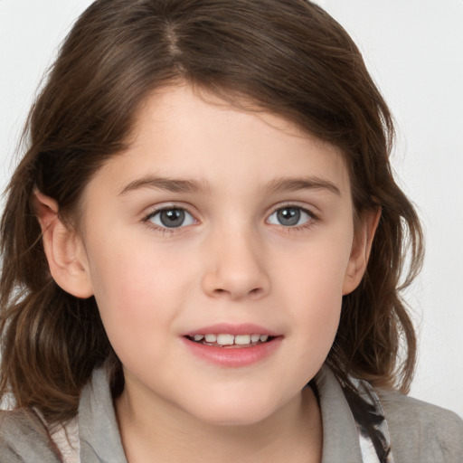 Joyful white child female with medium  brown hair and brown eyes