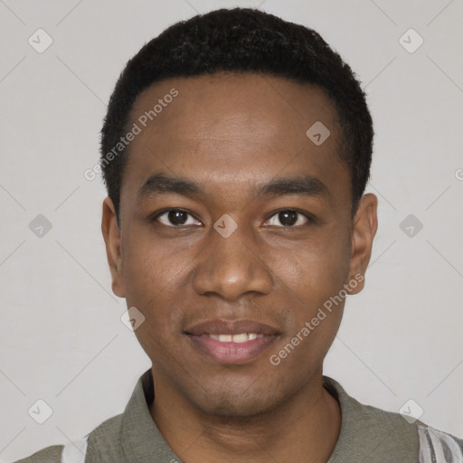 Joyful black young-adult male with short  black hair and brown eyes