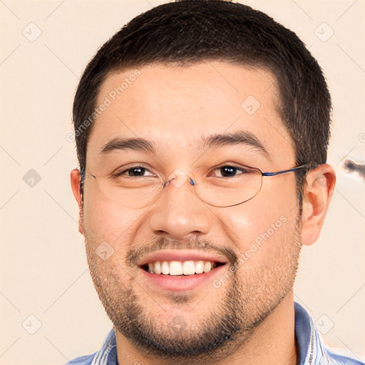 Joyful white young-adult male with short  brown hair and brown eyes