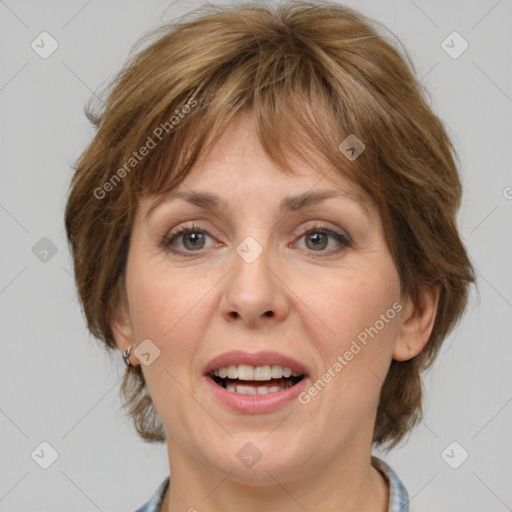 Joyful white adult female with medium  brown hair and grey eyes