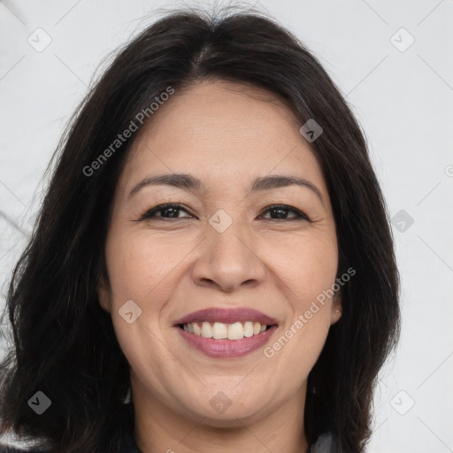 Joyful white adult female with long  brown hair and brown eyes