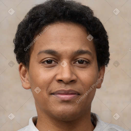 Joyful latino young-adult male with short  brown hair and brown eyes