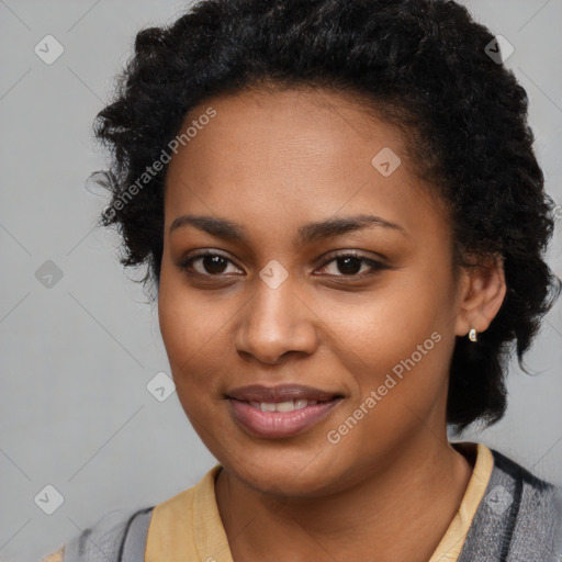 Joyful black young-adult female with medium  black hair and brown eyes