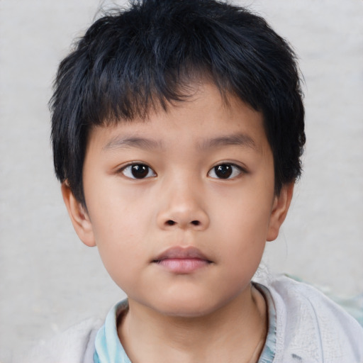 Neutral asian child male with short  brown hair and brown eyes