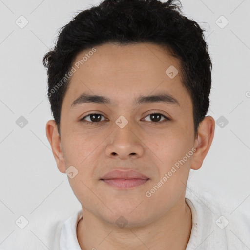 Joyful latino young-adult male with short  brown hair and brown eyes