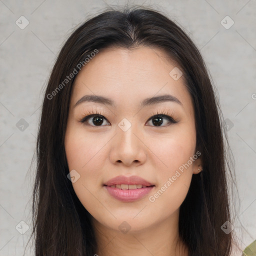 Joyful asian young-adult female with long  brown hair and brown eyes