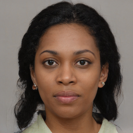 Neutral black young-adult female with medium  black hair and brown eyes