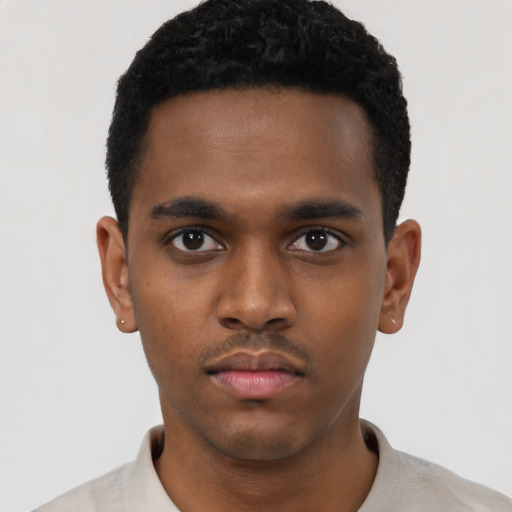 Neutral black young-adult male with short  brown hair and brown eyes