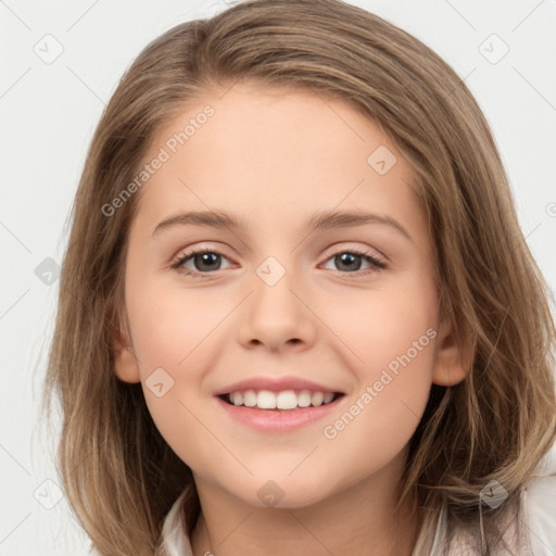 Joyful white child female with medium  brown hair and brown eyes